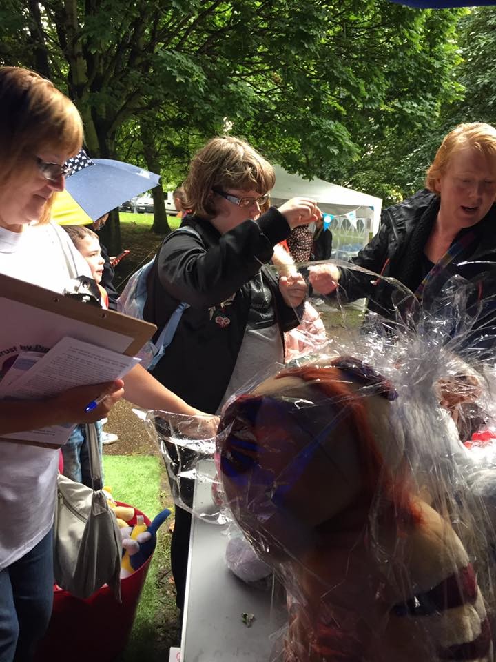 group of ladies selling tombola tickets