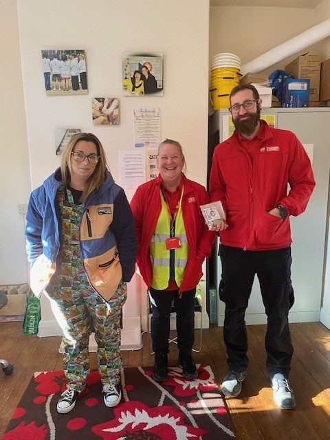 Picture of Kay and parcel force with their donation